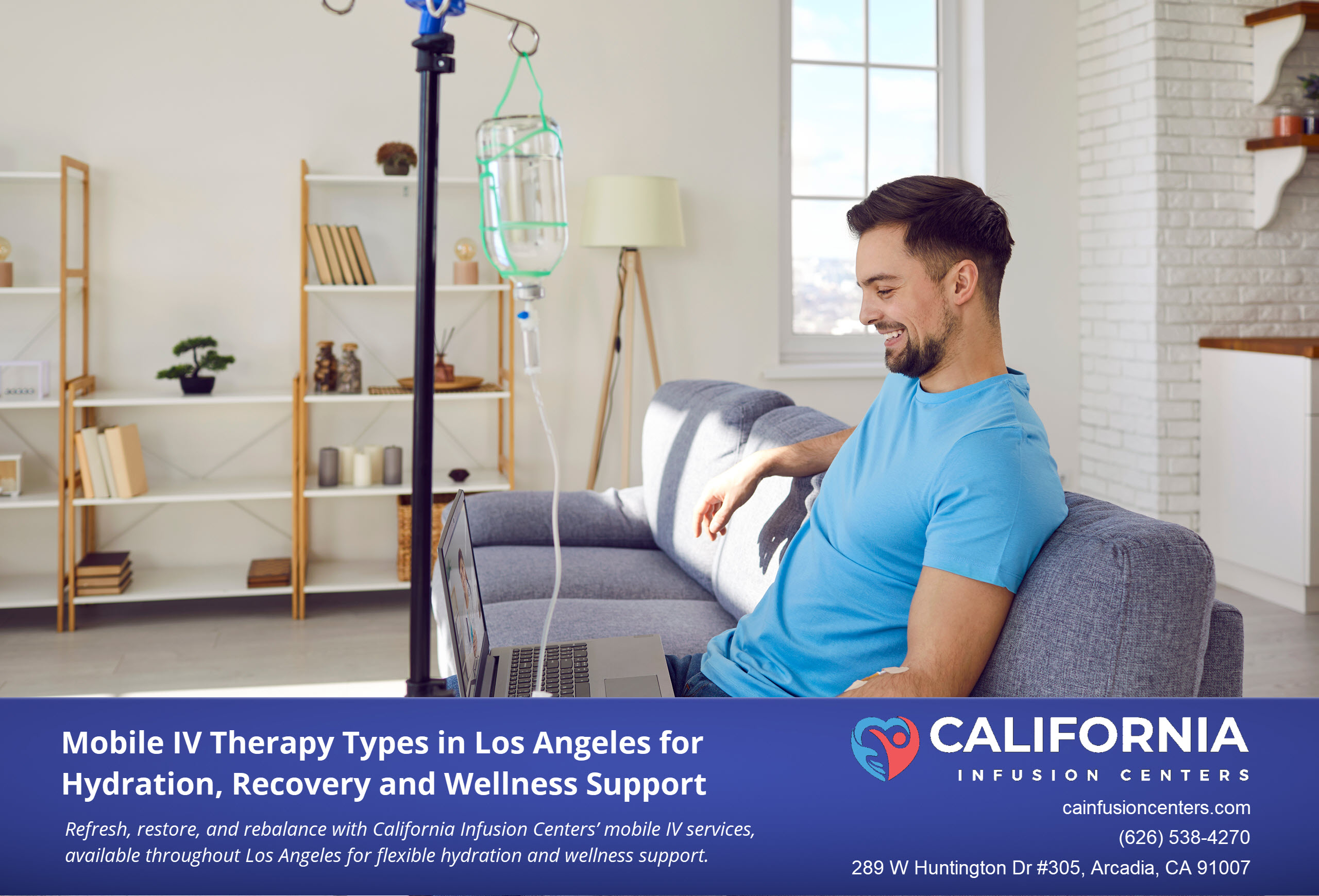 A man receives at home mobile IV therapy on his couch in Los Angeles, relaxing with a laptop while an IV drip delivers hydration and vitamins.