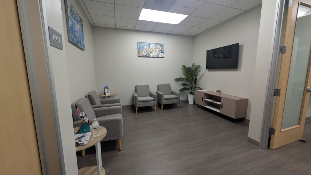 Modern waiting area at California Infusion Centers Arcadia clinic with comfortable seating, natural lighting, and calming décor.