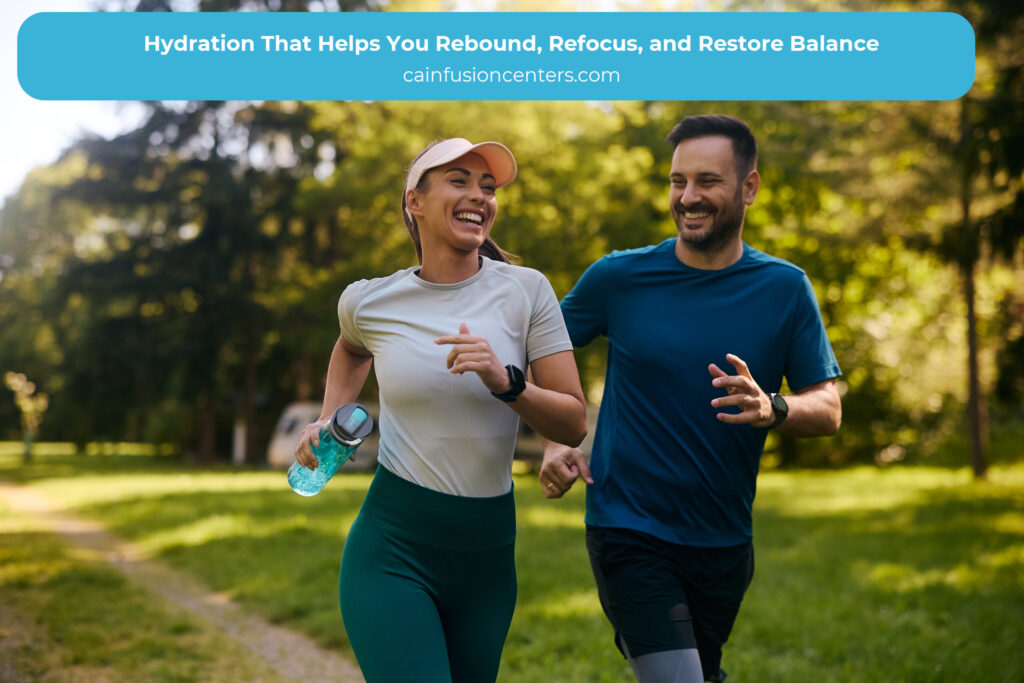 Smiling couple jogging outdoors in bright daylight, symbolizing hydration, recovery, and everyday wellness support.