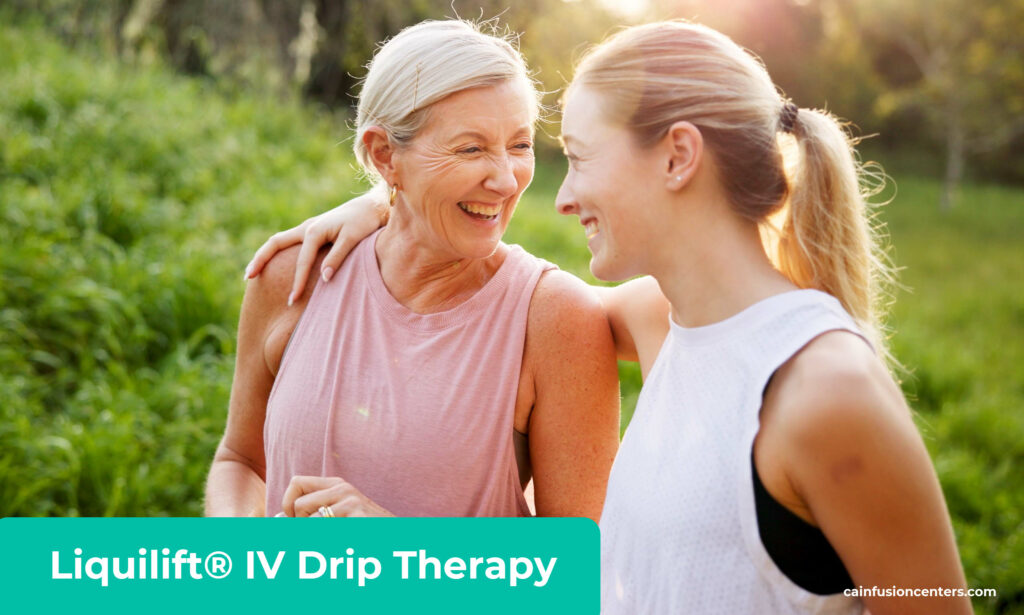 Two women smiling outdoors after IV hydration therapy, representing energy, balance, and wellness from Liquilift IV Drip Therapy