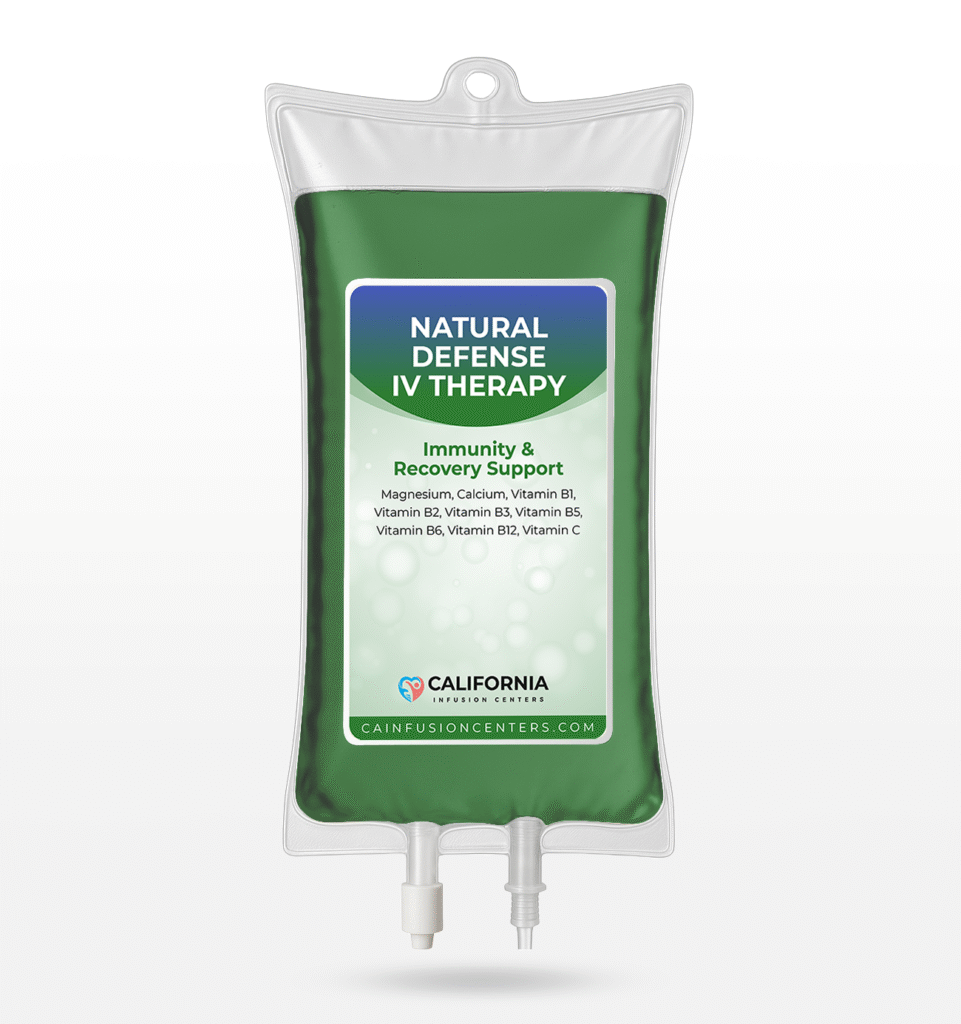 A green immunity-focused Natural Defense IV therapy bag with vitamins and minerals used for mobile IV treatments in Los Angeles.