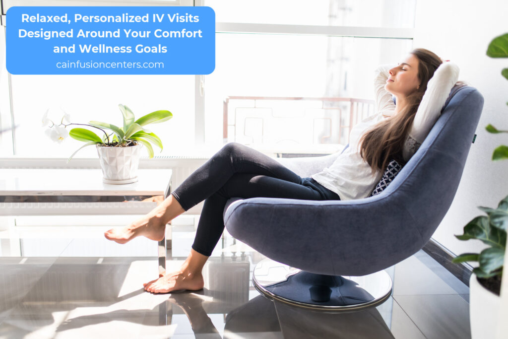 A woman reclines in a modern chair with her eyes closed, enjoying a calm and comfortable indoor wellness moment.