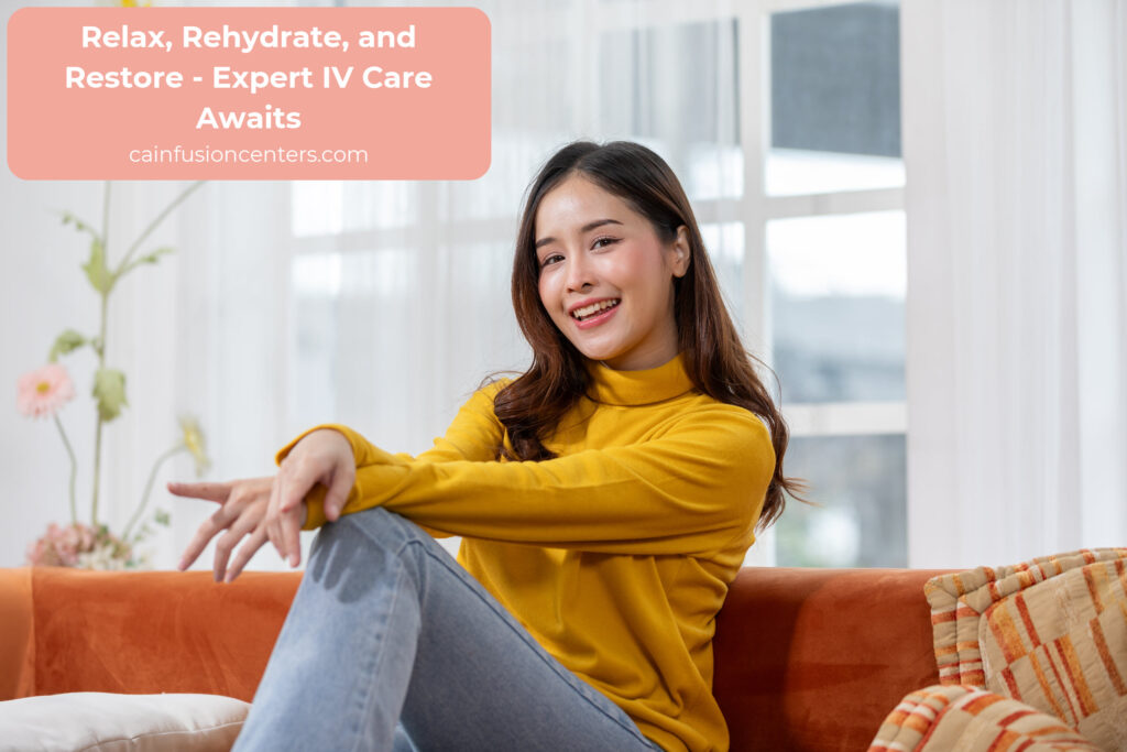Smiling woman seated in a bright modern space, reflecting comfort and relaxation after an anti-aging IV therapy session in Los Angeles