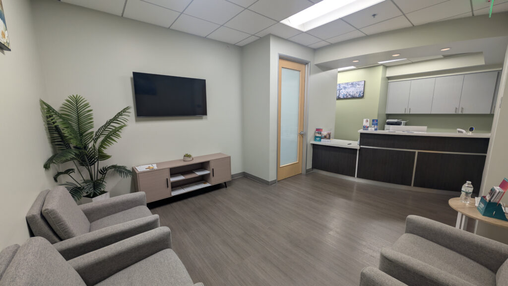 Modern IV therapy clinic interior at California Infusion Centers in Arcadia featuring a clean, comfortable waiting area and welcoming reception desk.