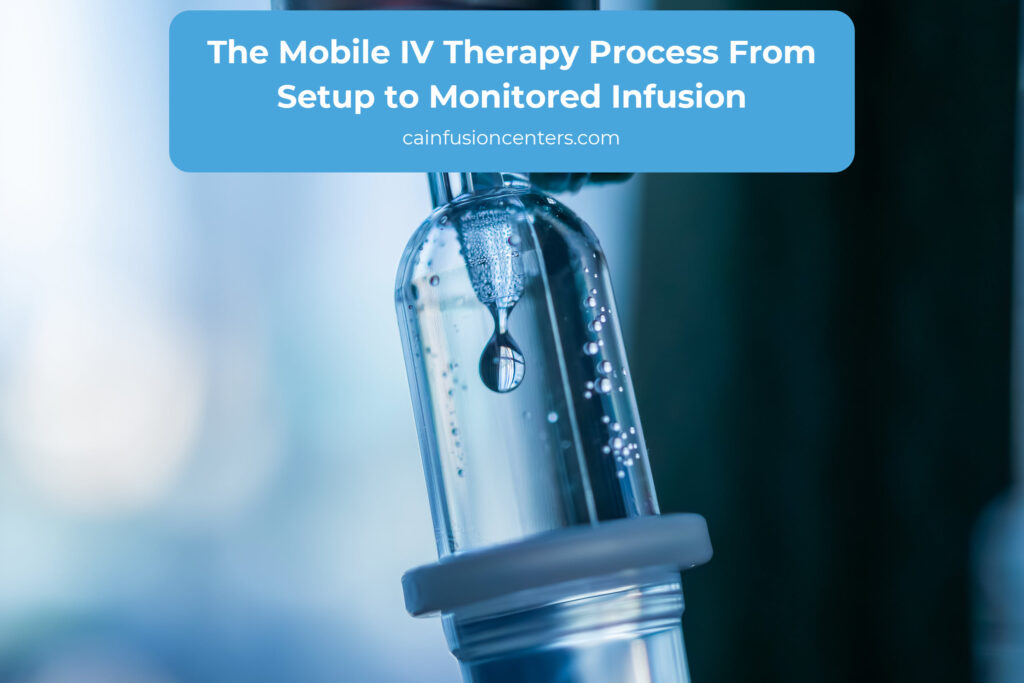 Close up of an IV drip chamber showing fluid flow during a monitored mobile IV therapy infusion process.